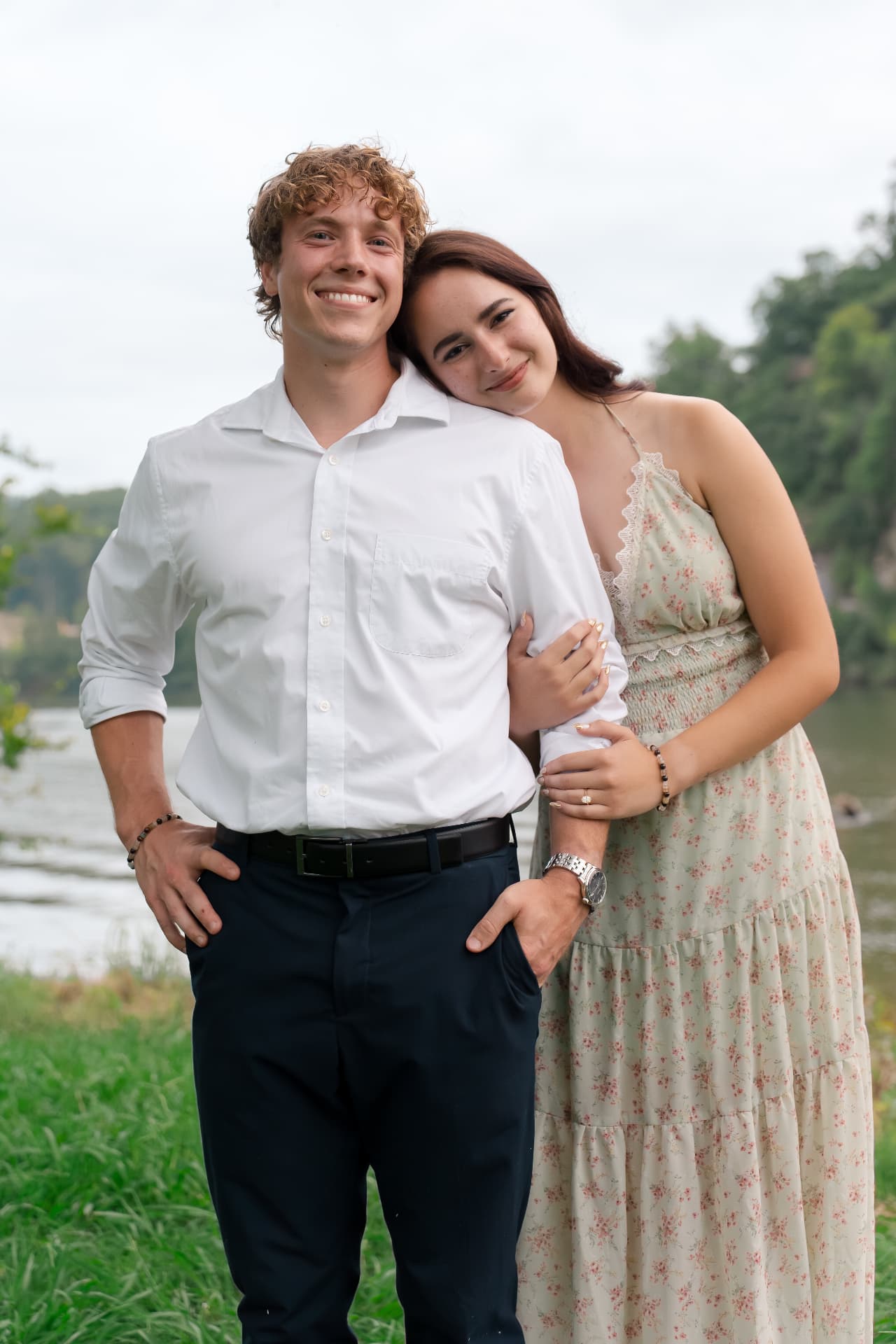 Zachary and Simoné standing together by the river